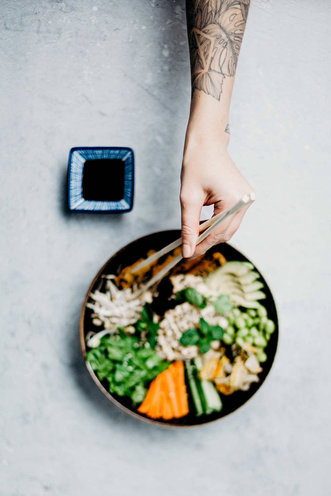 photo-of-person-holding-chopsticks-3297362.jpg